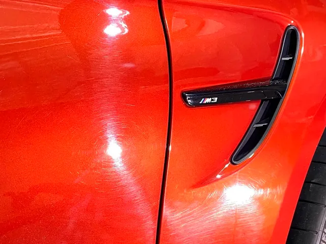 BMW M3 CS fender before correction, covered in swirl marks