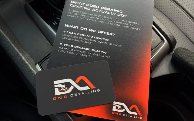The DNA Detailing ceramic coating care card left in the car