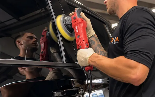 Andrew machine-polishing a panel to remove swirl marks
