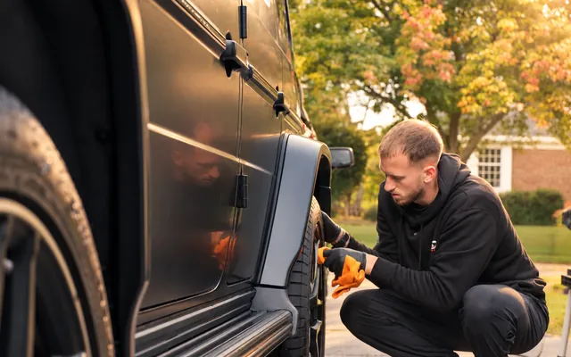 Andrew working the lower panels and wheel of a G63