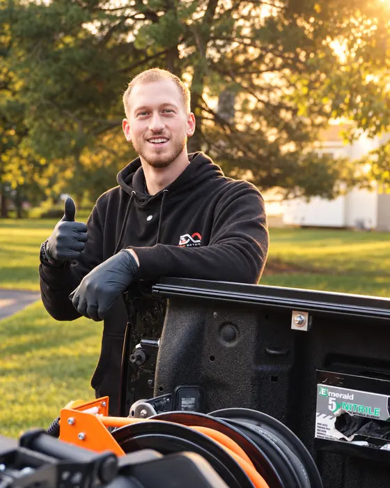 Andrew, owner of DNA Detailing, next to his mobile rig
