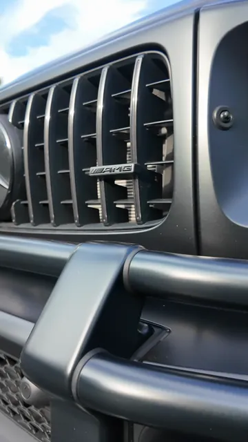 Chemical decontamination sprayed along the side of the G63
